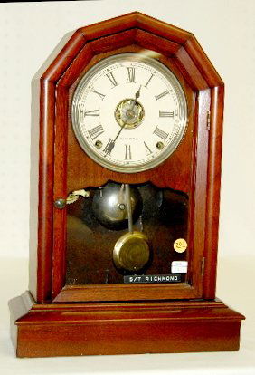 Seth Thomas City Series "Richmond" Clock: Seth Thomas City Series "Richmond" Clock: T & S; marked paper dial; has key and pendulum; in a nice case with a plain glass door. Not tested. 18 1/2" T.