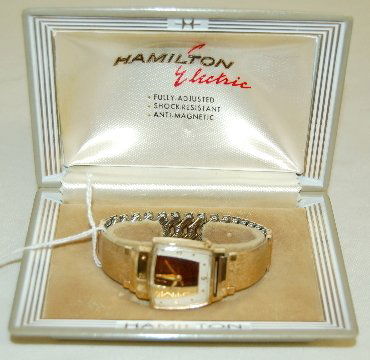 Hamilton 500 Electric "Biggs" TV Wrist Watch: Hamilton 500 Electric "Biggs" TV Screen Wrist Watch: in it's original box minur paperwork. Serial No. 54547L, adjusted. The gold and silver dial has all gold features with 2 color hands. In a Hamilton