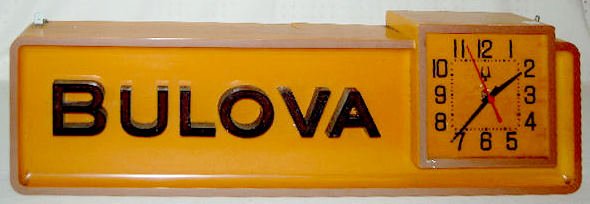 Bulova Lighted Advertising Clock Sign: Bulova Lighted Advertising Clock Sign: all plastic; clock works; does not light; made to hang. 10" T x 33" L