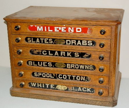 Clark's 6 Drawer Oak Spool Cabinet: Clark's 6 Drawer Oak Spool Cabinet: drawers labeled "Mile End" "Slates & Drab" "Clarks" "Blues & Browns" "Spool Cotton" "White Black" (Some paint flaking.)