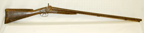 Antique P.Powell & Son Muzzle Loader Shotgun: Antique P.Powell & Son Muzzle Loader Shotgun: marked on side plates; 10 gauge; double exposed hammers; double trigger; has wood ram rod. (Wood shows use and wear; metal needs cleaned. This gun is mark