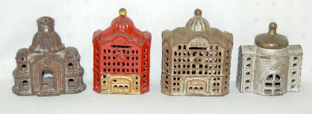 4 Cast Iron Domed Building Banks: 4 Cast Iron Domed Building Banks: 1.) AC Williams with the original paint and a coin slot in the front and back, 4 5/8". (75% of the paint is gone.) 2.) AC Williams with 98% of the original red and go