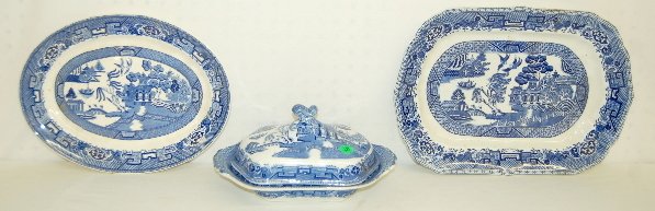 4 Pieces Blue & White "Willow" Ware: 4 Pieces Blue & White "Willow" Ware: 1.) Cobridge platter; 16" x 11" 2.) Oval platter by Homer Laughlin; 13 3/8" x 10 1/4" 3 & 4.) Ridgeways Semi Porcelain covered vegetable dish, 11 1/4" x 7 3/4" and