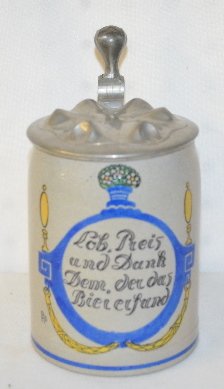 German Stoneware Beer Stein, Enameled Verse: German Stoneware Beer Stein: Merkelbach & Wick 1/2 liter; transfer stoneware with a salt glaze and enameled with a verse, signed F. Ringer; has a pewter lid.