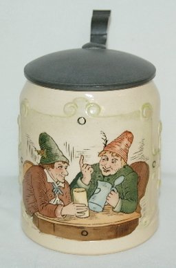 German Ornate Beer Stein, Men Drinking: German Ornate Beer Stein: Hauber / Reuther #170 1/2 liter; shows two men in relief drinking at a table and has a verse; has a pewter lid; marked HR 170.