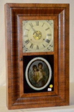 Seth Thomas 30 Hour O.G. Clock: Seth Thomas 30 Hour O.G. Clock: weight strike; has a metal painted dial and a reverse painted lower door. (There is minute veneer loss on the edges.) Not tested. 25" T.