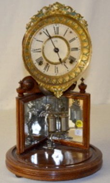 Ansonia Crystal Palace No. 2 Extra Clock: Ansonia Crystal Palace No. 2 Extra Clock: 8 Day, T & S; has a painted metal dial, a mirrored back and cupid figure; has pendulum and key. (There is no dome.) Not tested. 17" T.