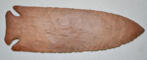 Native American Stone Spear Point: Native American Stone Spear Point: Made from a light brown material and corner notched; the edges have been napped into a very sharp state; this piece is very thin and well made.
