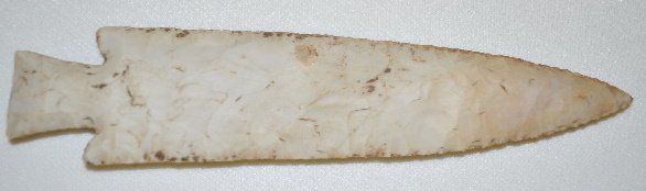 Native American Hardin Barb, Flared Base: Native American Hardin Barb, Flared Base: Made from a light gray material with slightly Taper edges that taper up into a relatively smooth body. The spear point is 6 3/8" L.