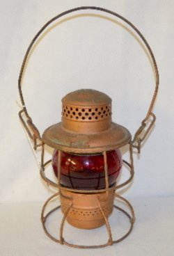 Adlake S.P. Co. Railroad Lantern, 1 Red Globe: Adlake S.P. Co. Railroad Lantern, 1 Red Globe: Red globe embossed Adlake Kero; Adlake Kero marked on the crown; S.P. Co. marked on the skirt; wire cage with bale handle, painted copper. No condition p