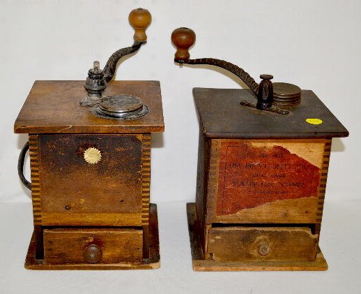 2 One Pound Coffee Grinders: 2 One Pound Coffee Grinders: wood dovetailed cases, 1 drawer, one has a partial label. (Some wood missing on the drawers.) 7 1/2" x 6 1/2"