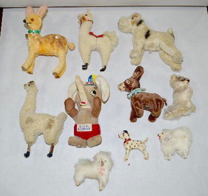 Steiff & Other Vintage Animals: Steiff & Other Vintage Animals: 1.) Airdale style dog. 2.) Dream Pets G.O.P. Elephant. 3.) 2 LLamas, one with wooden legs. 4.) Steiff Raccoon. 5.) Keywind deer. 6.) Keywind donkey (Rough. 7.) 3 German