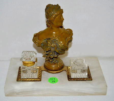 Art Nouveau Inkwell w/Spelter Bust of Woman: Art Nouveau Inkwell w/Spelter Bust of Woman: There are 2 glass reservoirs and an unsigned bust of a woman; sits upon an alabaster base. (There is a small chip on the base.) 6" x 7 1/2" x 4" **Please n