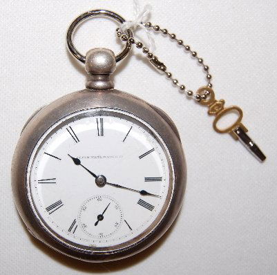 Elgin 7J 18S OF KW/KS Full Coin Pocket Watch: Elgin 7J 18S OF KW/KS Full Coin Pocket Watch: Serial No. 1804999 with a SSD; in a marked coin silver case with No. 4A over 4480; with the key. (The SSD is damaged. The case is scuffed and dented. The