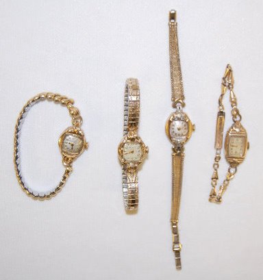 4 Ladies Wrist Watches - 3 Bulova, 1 Elgin: 4 Ladies Wrist Watches - 3 Bulova, 1 Elgin: 1.) Bulova 17J, 10K GF, No. 977166; there are 2 small diamonds set in the fancy lugs that show wear. (The crystal is scuffed; the watch is wound tight and n
