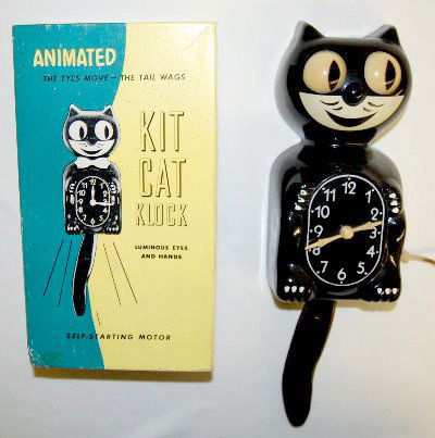 Allied Mfg Co. Kit-Kat Klock in Original Box: Allied Mfg Co. Kit-Kat Klock in Original Box: 1950's electric hanging clock with moving luminous eyes, hands and tail. Runs well. 13 1/2" T