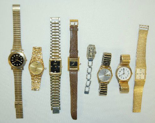 8 Wrist Watches, Bulova, Wittnauer & Others: 8 Wrist Watches, Bulova, Wittnauer & Others: 1.) Bulova Quartz with day and date display. (Not running.) 2.) Embassy Quartz 294-AL21 - Hong Kong. (Running??) 3.) Sharp Quartz 243334 UCC 364 - Japan. (