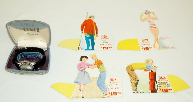 Elgin Sportsman Wrist Watch and Advertising: Elgin Sportsman Wrist Watch and Advertising: 1.) Elgin 17J Sportsman Wrist Watch with box and papers. 2.) Elgin Advertising Cut Outs: A.) Elgin Sportsman with man and golf clubs. B.) Elgin Advertising