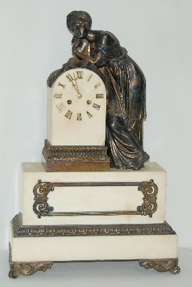 French Silk String Marble Statue Clock: French Silk String Marble Statue Clock: T & S; movement signed "Rouilly & Hooker Paris #4874"; marble with metal Roman numerals; has a statue of a lady in a long gown leaning on the top of the clock; 