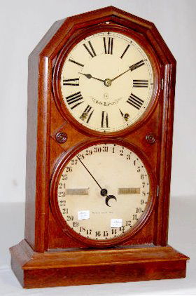 Seth Thomas Parlor Calendar #5 Clock: Seth Thomas Parlor Calendar #5 Clock: 8 day spring strike; with 8" dials; in a walnut veneer case. Not tested. 20" Tall (There is no pendulum with the clock.)