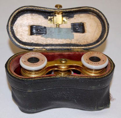 Opera Glasses from France: Opera Glasses from France: Abalone shell coated exterior, eye pieces and focus adjustor. Marked "LEMARIRE PARIS". In the original protective case. (There is a loose seam on one side of the case.)