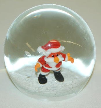 Murano Art Glass Santa Claus Paperweight: Murano Art Glass Santa Claus Paperweight: Has a white base with Santa Claus in the center; there is a paper label on the bottom. 3 1/4" Diameter No condition problems.