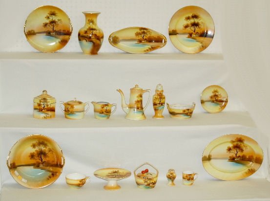 59 Pcs. Noritake Cottage Lake Scene Tableware: 59 Pcs. Noritake Cottage Lake Scene Tableware: This set includes 8 cups and saucers; 6 dinner, luncheon and bread plates; 6 sauce bowls; handled cake plate; 2 creamers; 2 sugars; small platter; an ope