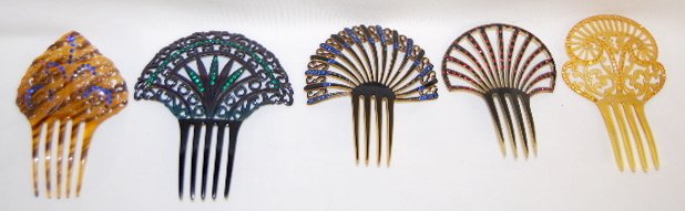 5 Vintage Plastic Haircombs with Rhinestones: 5 Vintage Plastic Haircombs with Rhinestones: 1.) Tortoise shell colors in fancy scrolling designs with blue rhinestone accents; 5 1/2" x 3 3/4" Wide. 2.) Dark green and black with green rhinestone ac