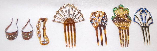 7 Vintage Haircombs, Plastic with Rhinestones: 7 Vintage Haircombs, Plastic with Rhinestones: 1. & 2.) Dark tortoise shell colored with clear rhinestones; made for a ponytail or small bun. 3.) Tortoise shell colored barrette with clear rhinestone 