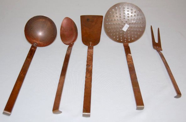 5 Portuguese Primitive Copper Utensils: 5 Portuguese Primitive Copper Utensils: Includes a meat fork, spoon, strainer, ladle and turner; all are marked Made in Portugal. Longest is 13 1/2" (They need to be polished.)