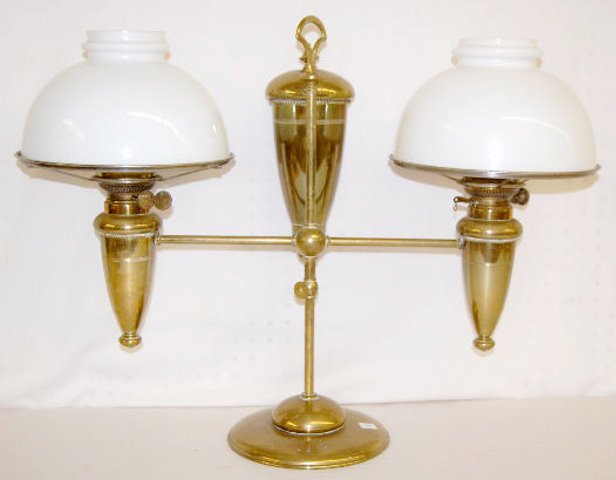 Brass Double Student Lamp, Kerosene, BH Duplex: Brass Double Student Lamp, Kerosene, BH Duplex: There are 2 burners with a torch shaped reservoir; marked BH on the wick turners; has 2 opaque glass shades. There are some spare parts in an envelope b