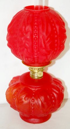 Mini Red Satin Beaded Drape Lamp, As Is: Mini Red Satin Beaded Drape Lamp, As Is: The shade and the base match each other; there is a chimney. 9 1/2" Tall to the top of the shade. (There is a 2" crack and minor rim chips on the shade; the ch
