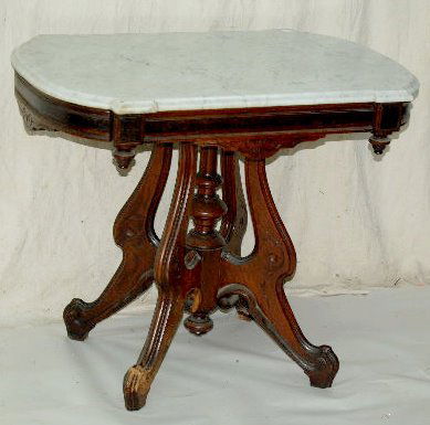 Antique Marble Top Parlor Table: Antique Marble Top Parlor Table: Has 4 legs with the center finial; with a grey and white marble top. 28" Tall x 33 1/2" x 23" (One leg is missing a piece of trim.) **Please note, this item ships F.O.