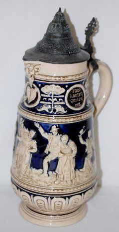 Germany Pottery 1 1/2 Liter Pied Piper Stein: Germany Pottery 1 1/2L Pied Piper Stein: Marked with a triangle (Simon Peter Gertz) and numbered 1083 with 2 sword like Xes; depicts a relief molded scene of 3 men with instruments leading 3 couples a
