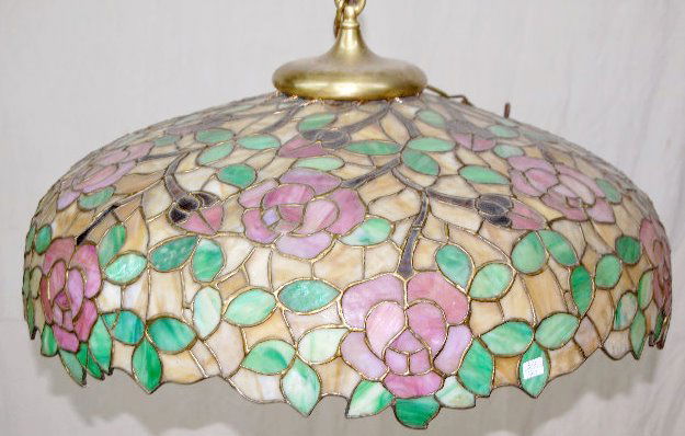 Antique Leaded Glass Hanging Light Fixture: Antique Leaded Glass Hanging Light Fixture w/Roses: There is an all over design of pink slag roses and rose buds; with green leaves; in between the designs are caramel slag pieces. 28 1/4" Diameter (T