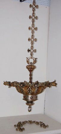 Large Vintage Bronze Hanging Light Fixture: Large Vintage Bronze Hanging Light Fixture: Electric; with acanthus leaf and fleur di lis motif and 18 light sockets; with an extra extension chain. 55" x 28" Diameter