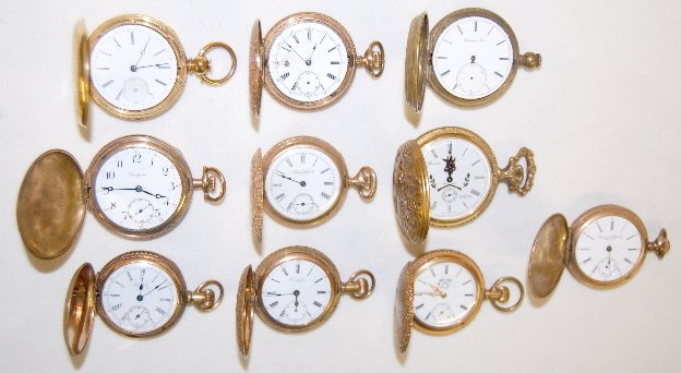10 Size 6 - 10 Range HC Pocket Watches: 10 Size 6 - 10 Range HC Pocket Watches: This group includes: Trenton, Tacy, Evington, King, Seth Thomas, Plymouth, Montandon and three with no name. All sell as is, where is.