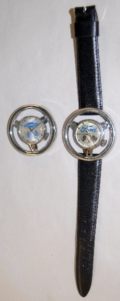 2 Steering Wheel Wrist Watches, Ford & Chevrolet: 2 Steering Wheel Wrist Watches, Ford & Chevrolet: They are Swiss made; the Ford has a band on it. They sell as is, where is.