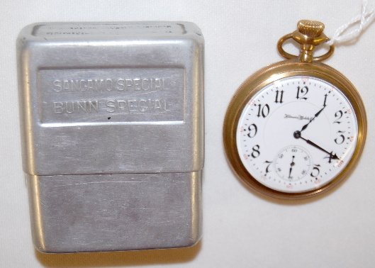 Illinois 16S Sangamo 21 Ruby Jewels Pocket Watch: Illinois 16S Sangamo 21 Ruby Jewels Pocket Watch: adj. 6 positions and sync.; DMK, 3/4 Double Rollers; GJS, in Aluminum protector, serial number 1899726. Running. All sell as is, where is.