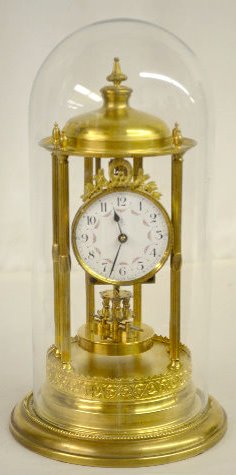 G. Becker Disc Pendulum Dome Clock: G. Becker Disc Pendulum Dome Clock: Marked G.B. with anchor and "Becker Germany" on the porcelain dial; the movement is marked "Gustav Becker Germany". There are 6 metal columns with a wreath above th