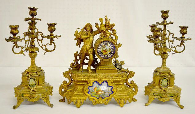 French 3 Piece Garniture Set w/Sevres Inserts: French 3 Piece Garniture Set w/Sevres Inserts: With a bell striking movement, No. 1463 and a porcelain dial with a bridge scene. The windmill scene below the dial is signed "Sevres". The white metal c