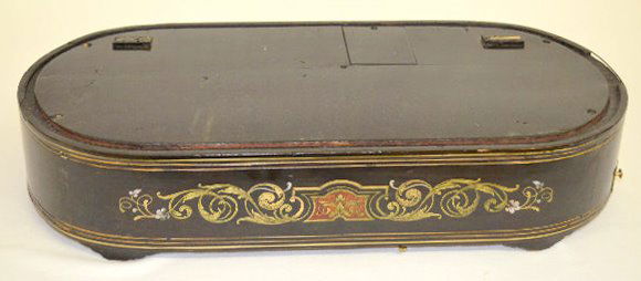 Old Wood Musical Base to a Clock: Old Wood Musical Base to a Clock: In the ebonized wood base there is a 4 1/4" cylinder music maker with No. 7535 on it. The cylinder looks good. There is no indication of how many tunes it plays. (The