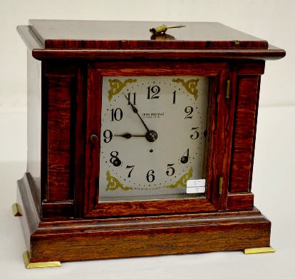 Seth Thomas Sonora Chime Red Adamantine Clock: Seth Thomas Sonora Chime Red Adamantine Clock: This mahogany adamantine clock with an 8 day T&S movement with 1/2 hour and hour chimes has a silver colored metal dial with gold colored decoration and 