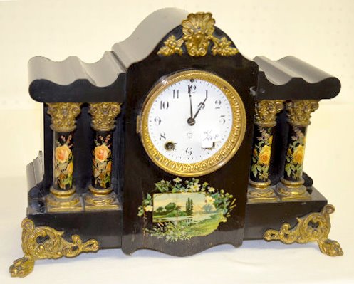 Seth Thomas "Floral" Enameled Mantel Clock: Seth Thomas "Floral" Enameled Mantel Clock: With an 8 day T&S movement and a marked porcelain dial. In an enameled wood case with rose decal pillars and a lake scene on the front, metal ornaments and 