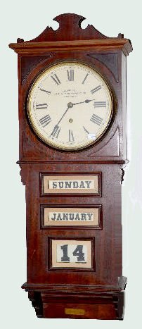 Prentiss "Empire" Calendar Wall Clock: Prentiss "Empire" Calendar Wall Clock: With a TO movement; a marked paper dial, the pendulum and key. The rotary dials show the day, month and date. Not tested. 37 1/2" Long Sells as is, where is.