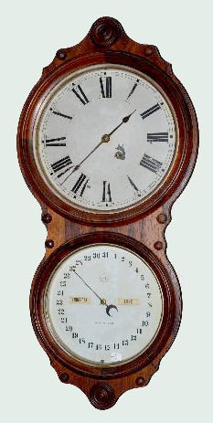 Seth Thomas Office Calendar Clock: Seth Thomas Office Calendar Clock: In a rosewood veneered case with an 8 day TO, weight driven movement; a metal upper dial marked "Regulator" and a Seth Thomas lower dial. The weight is with the cloc