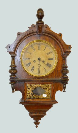 F. Kroeber Hanging Wall Clock: F. Kroeber Hanging Wall Clock: With a T&S movement; an unmarked paper dial; a paper label on the back and the pendulum. Not tested. (The dial is stained.) 30" Long Sells as is, where is.