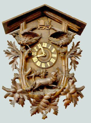 Black Forest Carved Cuckoo Clock, Fox, Deer & Pheasants: Black Forest Carved Cuckoo Clock, Fox, Deer & Pheasants: unmarked movement; a wooden dial with plastic numerals; 3 pine cone weights and carved leaf pendulum; the case has carved pheasants, fox and de