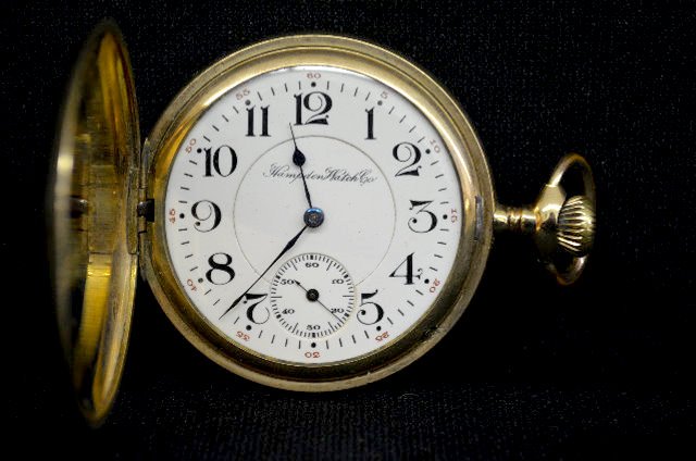 Hampden 21 J 16S Hunting Case Pocket Watch: Hampden 21 J 16S Hunting Case Pocket Watch: With Serial No. 2805762; a porcelain dial with seconds bit and marked "Hampden:; adjusted to 3 positions; double roller and safety pinion. In a YGF case num