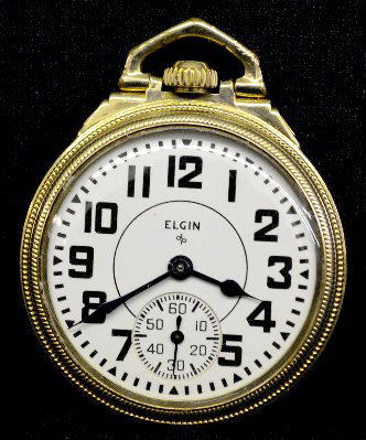 Elgin 571 BW Raymond 21 J 16S OF GF Pocket Watch: Elgin 571 BW Raymond 21 J 16S OF GF Pocket Watch: With Serial No. V529874; 8 adjustments; straight line DMK; and an Elgin SSD with seconds dial. In a yellow Star SF&B case NO. 5725486. The back of the